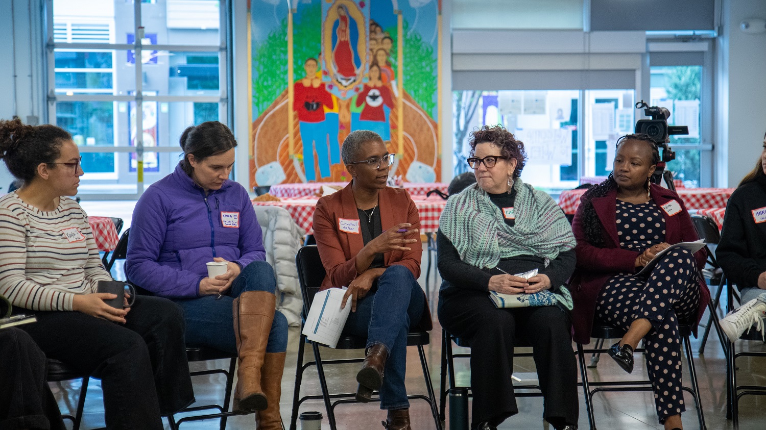 Crystal Hall speaks to circle of participants